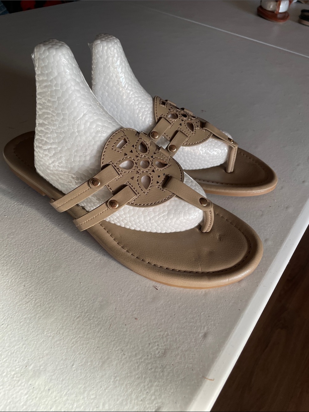 Women’s Tan Thong Sandals with Decorative Cutout Medallion